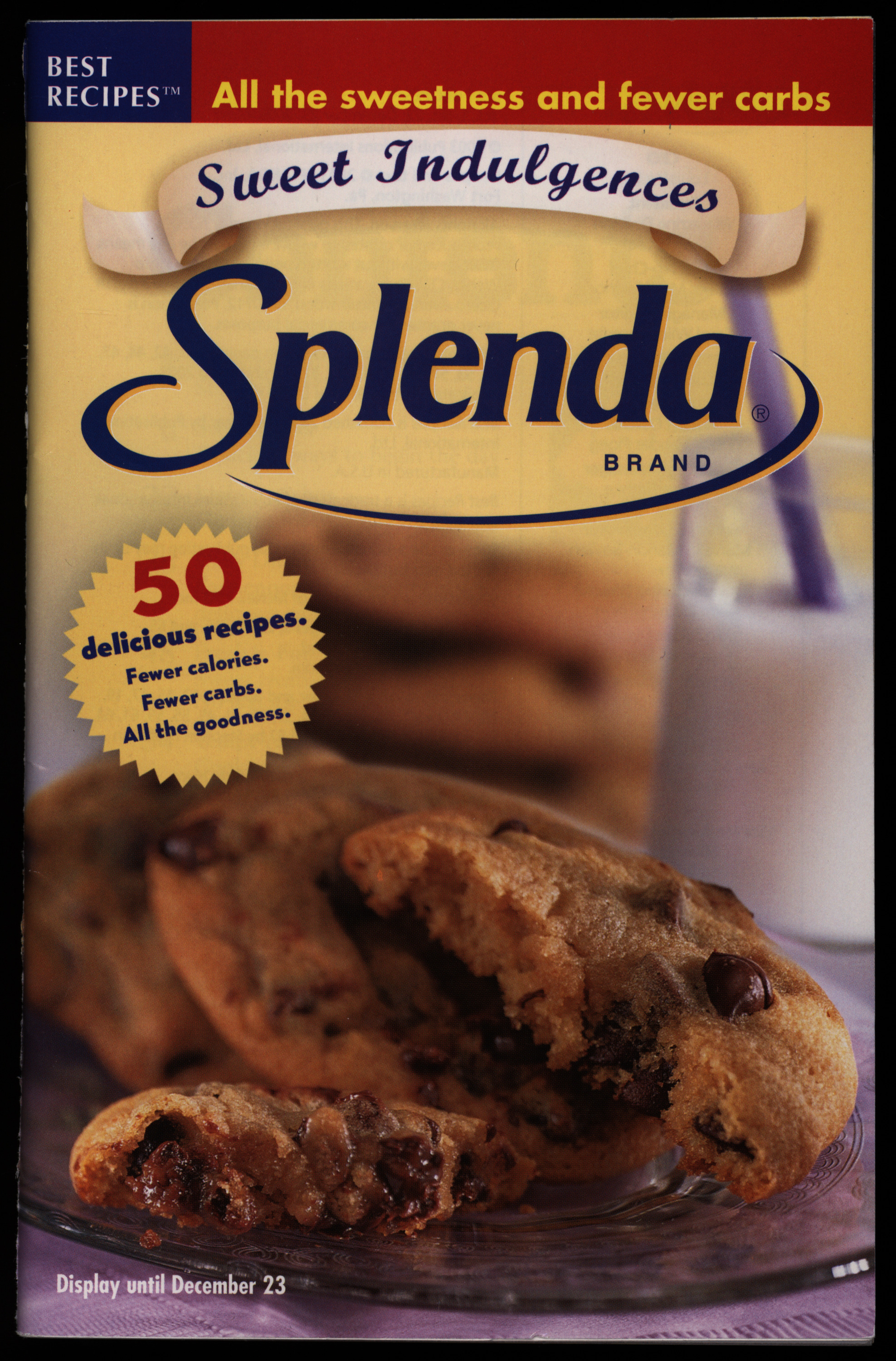 Magazine cover with cookies and milk against a yellow background.